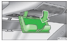 Skoda Roomster. Fig. 62 Découpure dans le revêtement de pavillon : compartiment à lunettes